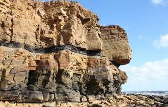 sandstone cliffs with seam